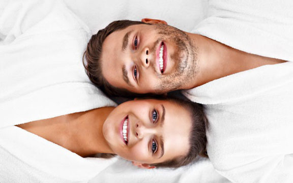 Couple using hyaluronic acid daily Volumizer Growth Factors