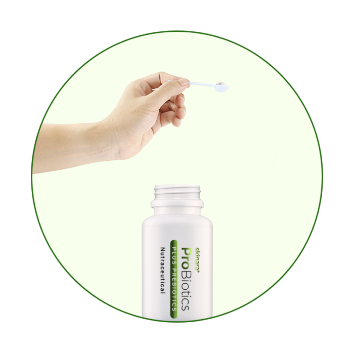 Probiotic nutraceutical bottle with lactobacillus powder and spoon